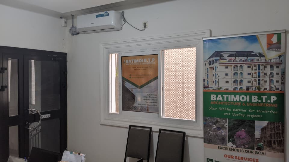 Design workspace at the BATIMOI BTP architecture and construction office in Buea, Cameroon